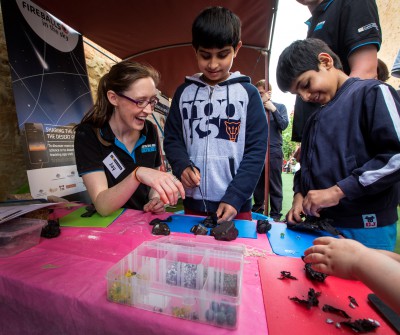 Jay at Fremantle Earth Science Day dissecting meteorites